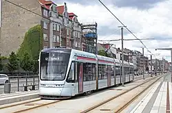 A Variobahn tram facing the viewer in an urban setting