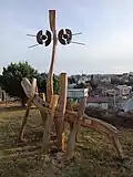 Wooden statue "čumil osminohý" (eight-legged gaper)