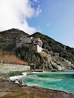 the monastery as seen from a nearby cliff