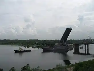 The large landing ship Yamal passes under the Inhul Bridge