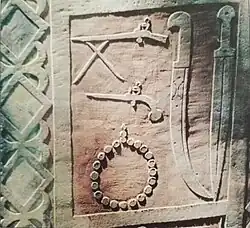 Chechen Warriror Tombstone showing Khirimi, Pistol, Shashka, Kindjal, & Bandolier