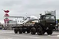A military drone being carried by an offroad vehicle from MZKT.