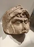 Male head with helmet. Alabaster with traces of paint. High Palace (2nd-3rd century CE)