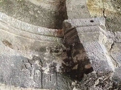 A column extending to the ceiling