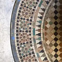 Zellij paving around the fountain of the al-Attarine Madrasa in Fez