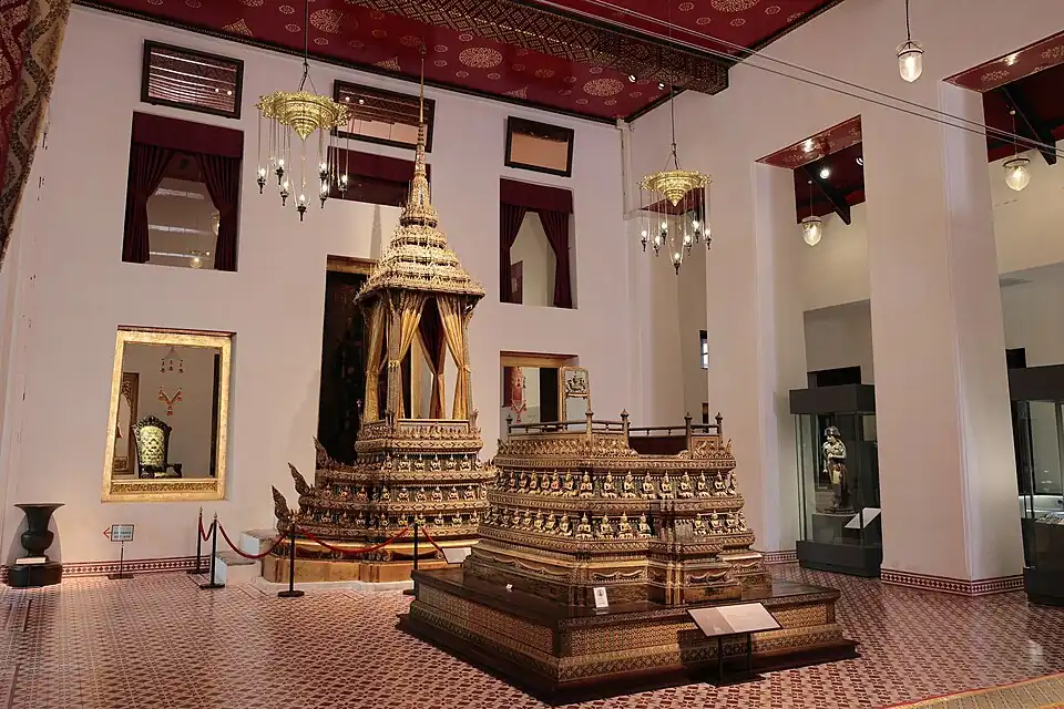 The Busabok and the royal throne in the audience chamber of the Issara Winitchai Throne Hall.