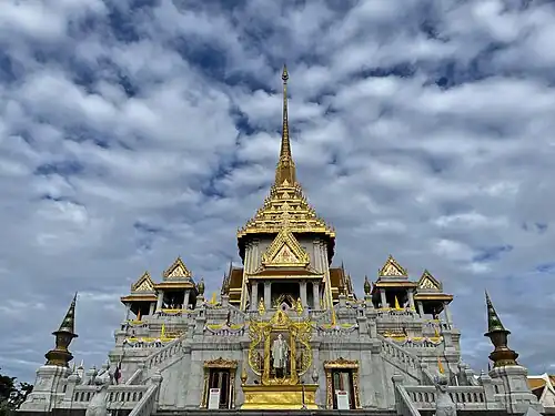 The front view of the Phra Maha Mondop, with a royal portrait display of King Bhumibol placed in front of the main staircase.