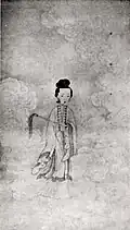 In Taoist costume