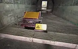 Entry and exit tunnel used by looters to breach the burial chamber