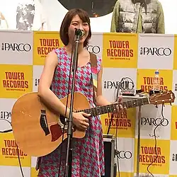 Aoi Yamazaki wearing a colored houndstooth dress