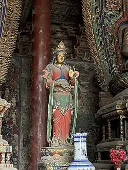 Attendant Bodhisattva beside Baosheng Fo