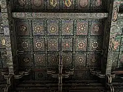 Mural painting on the ceiling depicting Sanskrit words