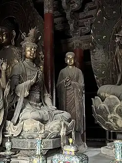 Liao dynasty statues of the Bodhisattva Puxian with a disciple