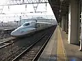 A N700-7000 series set at Hakataminami Station