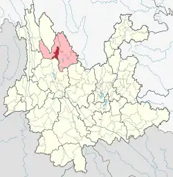 Location of Gucheng District (red) and Lijiang City (pink) in Yunnan