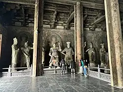 Statues of some of the Twenty-Four Deities on one side of the Daxiong Baodian