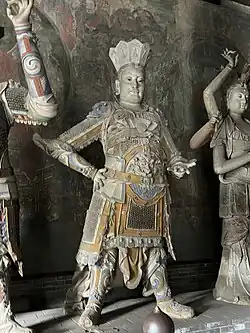 Statues of Duowen Tianwang (left)