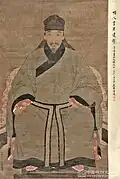 Ming dynasty man in full shenyi called daopao wearing a fujin.