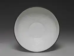 Bowl with impressed paired phoenix design, Qingbai ware, Song–Yuan dynasty. National Palace Museum.