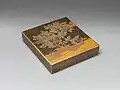 Edo period 18th-century suzuri-bako depicting a warbler in a plum tree, made in lacquered wood with gold and silver inlay