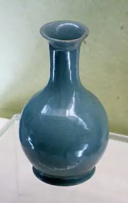 Gooseneck vase (汝窯天藍釉刻花鵝頸瓶) with sky-blue glaze and incised floral decoration, Ru ware, Northern Song dynasty, c. 1086–1125 CE