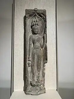 Tang dynasty (618-907) Chinese stone statue of Shiyimian Guanyin from Baoqing Temple in Xi'an, Shaanxi, China. Held at the Museum of Fine Arts, Boston, in Massachusetts, USA.