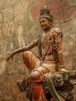 Water-Moon Guanyin, Liao dynasty (11th–12th century). Wood with polychrome and gold. Nelson-Atkins Museum of Art.