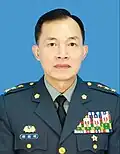Republic of China Army (ROCA) General Chung Shu-ming, wearing a dress uniform with a metal name pin showing his full name in Chinese