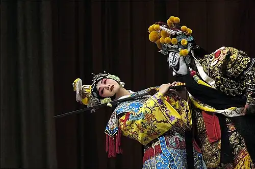 Two Peking operas on stage, performing the final act in "The Hegemon-King bids His Concubine Farewell"