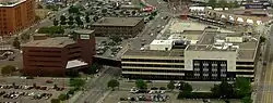 Aerial view of two multi-storey buildings in a downtown area