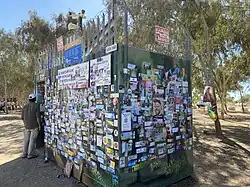 Bomb shelter at the site decorated with memorial posters