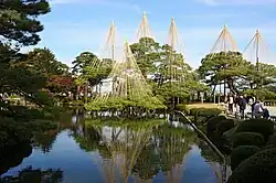 Kenroku-en Landscape Garden in Kanazawa City, Ishikawa Prefecture. The pine trees are covered by the yukitsuri, preventing them from falling in winter when it snows heavily.