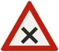 1.39 – Crossroads (with priority to the right) (formerly used )