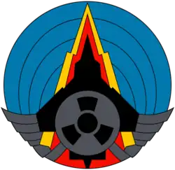 The logo for 151 Squadron (Blue concentric circles, a mountain, a plane rising north, a nuclear radiation symbol)