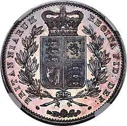 Silver coin with a coat of arms