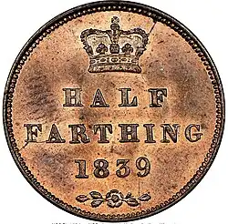 Copper coin with its value in words and date of striking