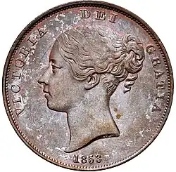 Copper coin with a woman's head facing left