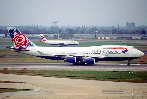 747 in "Utopia" livery and Chelsea Rose tail art (photo from 2002, livery used 1997–2006)