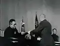 Chiang Kai-shek, chairman of the Nationalist Government, turned the draft approved by the Political Consultative Conference to Hu Shih, rotating chairman of the National Constituent Assembly.
