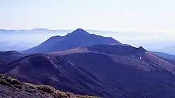 Shinmoedake Volcano (front) and Takachihonomine Volcano