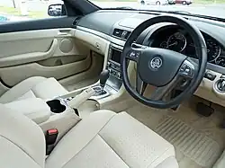 The Luxury interior, with its beige and black design.