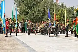 Image 28President Hamid Karzai observing the honor guard of the Afghan armed forces during the 2011 Afghan Independence Day. (from Culture of Afghanistan)