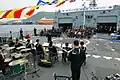 A band plays aboard ROKS Yulgok Yi I during the 70th Anniversary of founding Republic of Korea Navy on 10 November 2015.