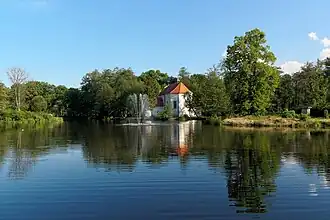 A pond with a church on an island, Zwierzyniec
