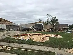 A beige house with only few walls standing