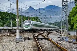 Passenger train D90 passes through Aoshang Station