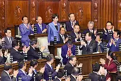 Sanae Takaichi became the first female Prime Minister of Japan, as well as longtime Kansai-based politician; the formation of the Takaichi Cabinet and the conservative LDP-JIP coalition won historic landslide victory at the 2026 Japanese general election, marked the end of a two-year political crisis.