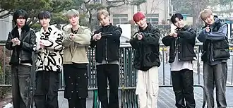 All(H)Ours in January 2024 L–R: Masami, Minje, Xayden, Kunho, Youmin, On:N and Hyunbin