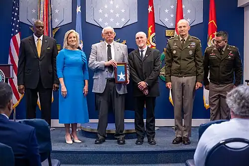 Lloyd Austin, Christine Wormuth, Randy A. George and Michael Weimer with Shadrach's family at the Pentagon Hall of Heroes Induction Ceremony (July 4, 2024)