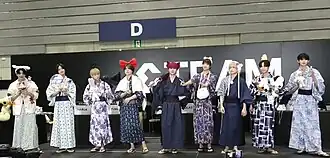 &Team in September 2024 From L–R: Maki, K, Harua, Fuma, Nicholas, EJ, Yuma, Taki, and Jo